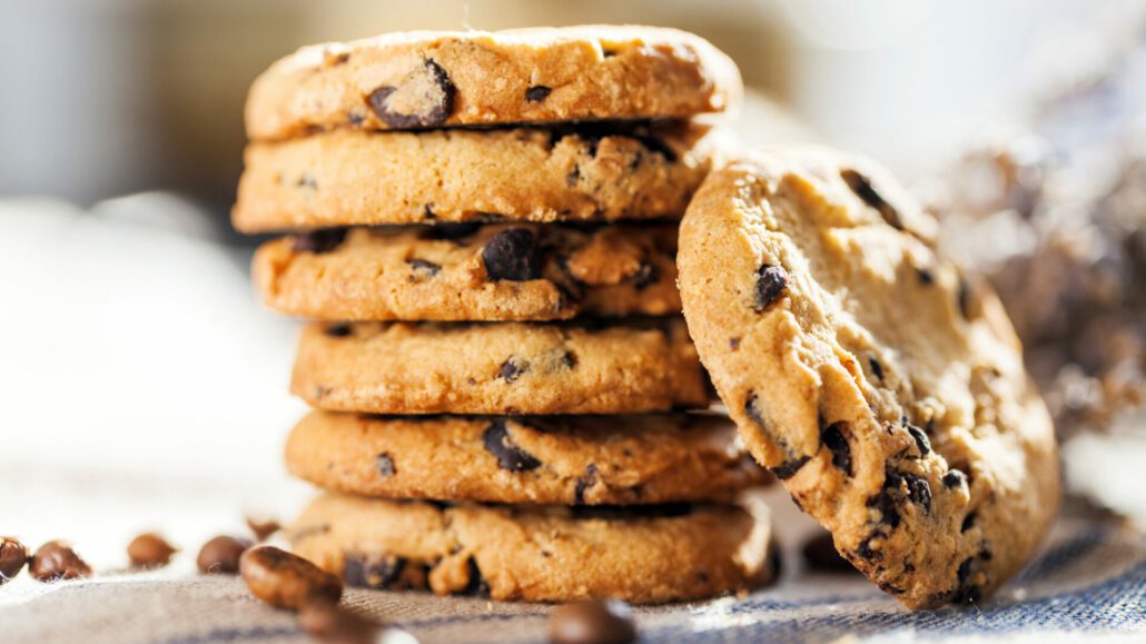 A delicious stack of chocolate chip cookies.