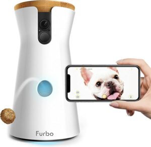 Image of a white and blue Furbo Dog Camera, a high-tech device that allows dog owners to monitor their pets remotely and interact with them through the camera's two-way audio and treat-tossing features. This device is perfect for keeping an eye on your furry friend, while you're away from home.