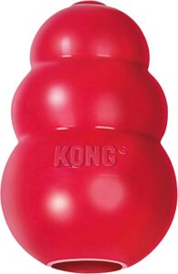 Image of a red Kong Classic Dog Toy, a durable and interactive toy that provides mental and physical stimulation for dogs. This toy is perfect for stuffing with treats and keeping your furry friend occupied for hours. The Kong Classic Dog Toy is a must-have for dog lovers in 2023