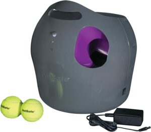 Image of a PetSafe Ball Launcher, an automatic and interactive toy that throws balls for dogs to chase and fetch. This device is perfect for providing dogs with exercise and mental stimulation, while also giving owners a break from constantly throwing the ball themselves. The PetSafe Ball Launcher is a must-have for dog lovers in 2023.