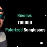 A smiling Tony wearing TOODOO polarized sunglasses, posing against a black background with the post title "Review: TOODOO Polarized Sunglasses - A Budget-Friendly Option for Outdoor Activities" written in teal and white font.