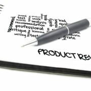 Banner image for the post, How to Write Product Reviews: Honesty and Thoroughness are the Key, featuring a notebook with a pen and several terms related to product reviews written on the page.