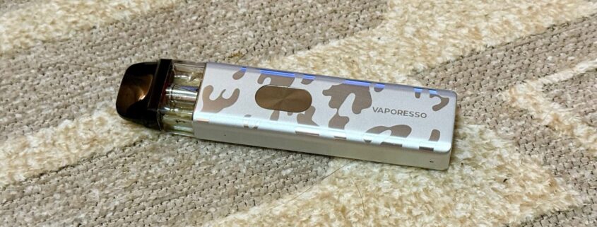 Vaporesso XROS 4 Mini Art Edition pod vape on carpet