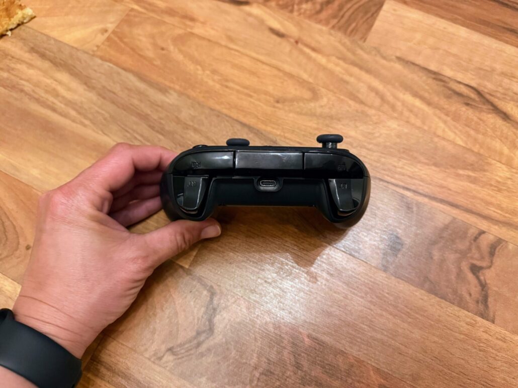 Top view of PowerA Wired Controller showing bumper buttons and USB port