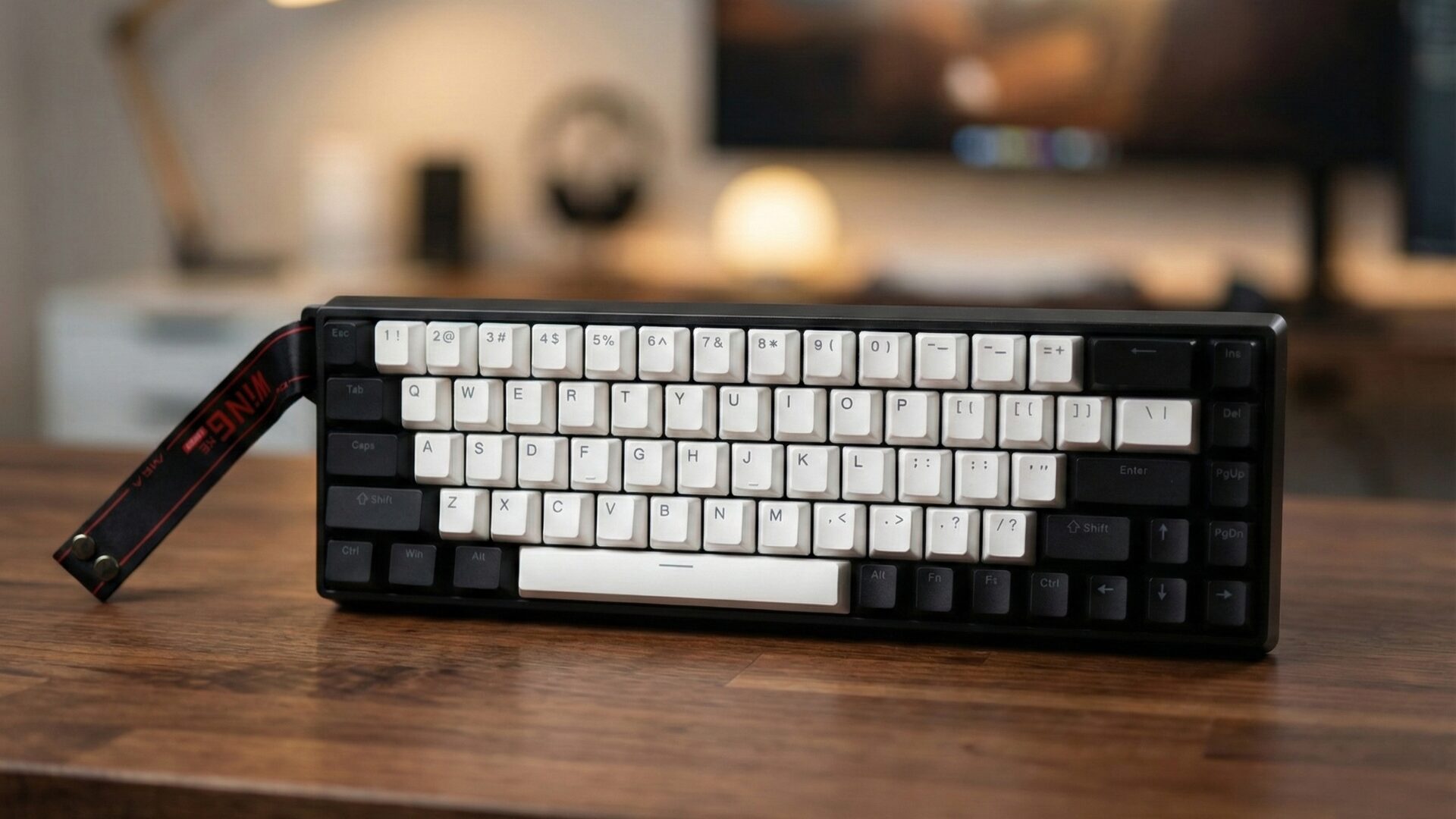 A professional shot of the AULA WIN68 HE mechanical gaming keyboard sitting on a wooden desk, featuring black and white keycaps and a distinctive 'WING HE Series' carrying strap.