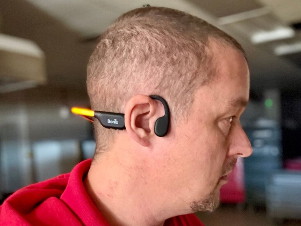 Tony wearing Bonic Cycle bone conduction headphones with rear safety light on.