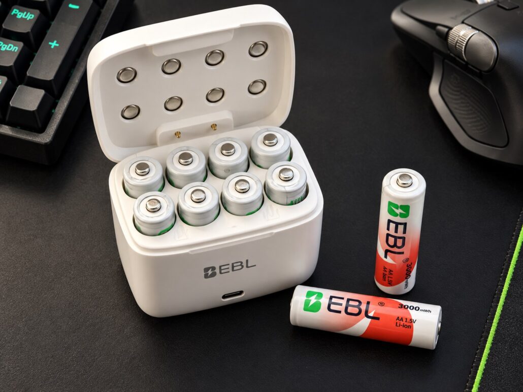 EBL AIR III charging box with rechargeable AA batteries arranged beside it